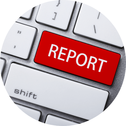 Keyboard with the word "Report" highlighted in red.